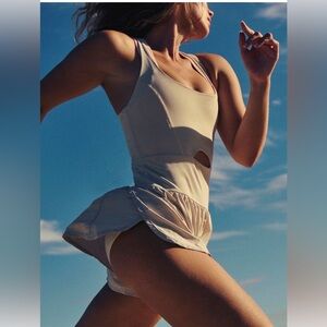 NWOT Free People Movement Righteous Onsie in Highlighter Yellow